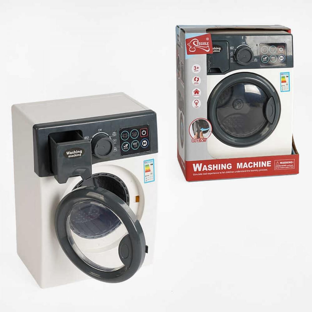 Пральна машинка звуки, підсвічування, крутиться барабан, відкриваються дверцята, тріскачка, в кор. /24-2/