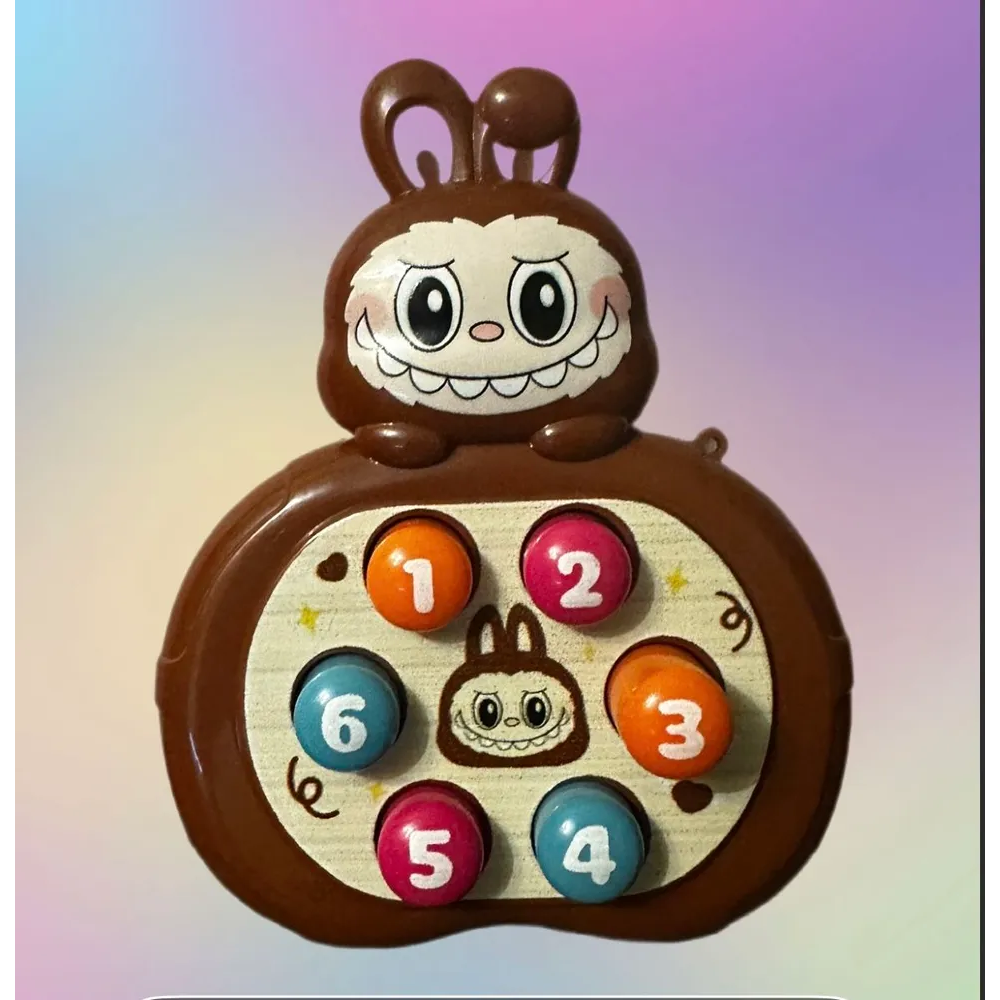 Розважальна гра "LABUBU" механічний принцип роботи 13х10х4см /24/432/18шт в кор.