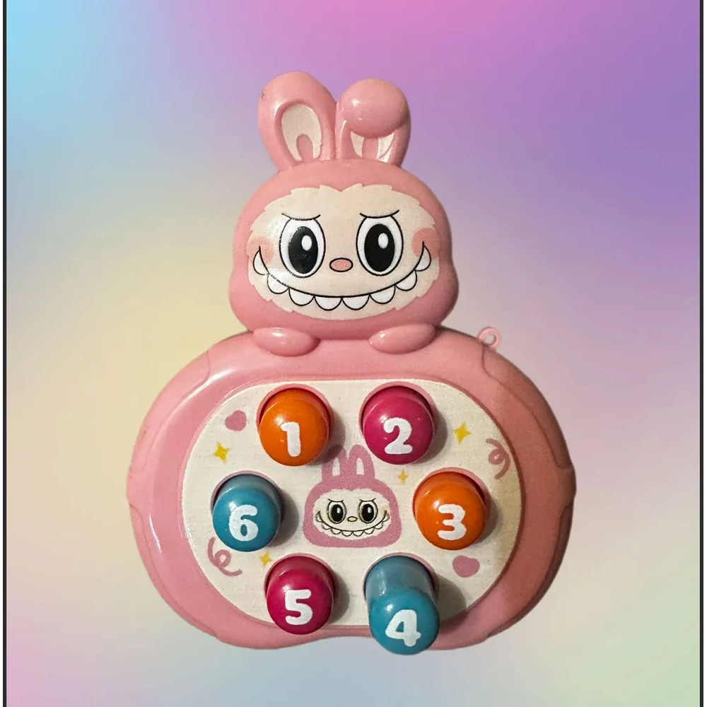 Розважальна гра "LABUBU" механічний принцип роботи 13х10х4см /24/432/18шт в кор.